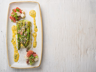 Vegan salad dish over black retro background and space for recipe