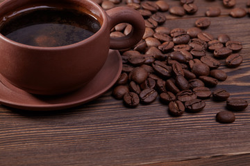 Cup of coffee on wooden table