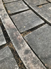 Abstraction from paving slabs.