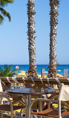 Cafe on the sandy beach.  Holidays concept image. Greece