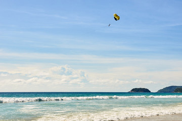Parachute flight. Blue sea. freedom
