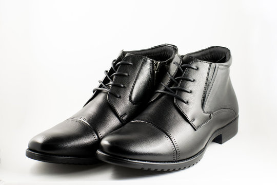 Black man's leather boots. Stylish black man's shoes.