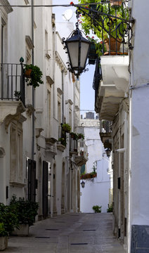 Beautiful street in whitewashed town Locorotondo, Apulia