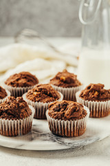 Delicious homemade muffins on a marble board, close up