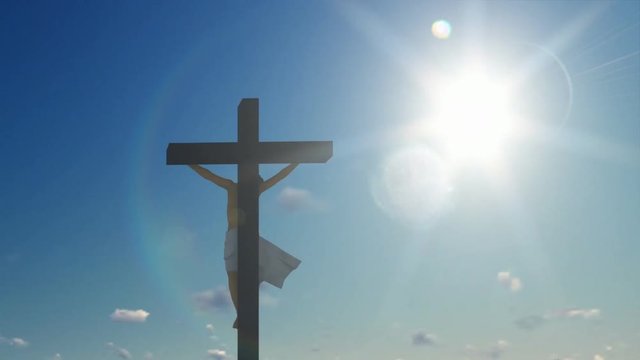 Jesus cross against blue sky, zoom out