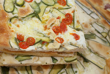 bread with tomato zucchini and mozzarella cheese for sale in the street food stall