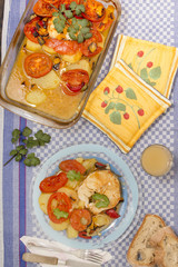 fish with potatoes and tomato