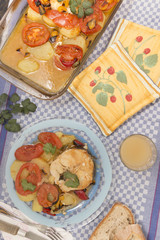 fish with potatoes and tomato