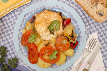 fish with potatoes and tomato