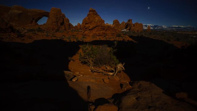 Moonrise Shadows Creep Across Landscape at the Windows, Arches National Park, Utah