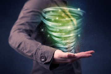 Woman holding green tornado