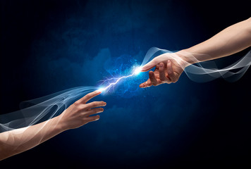 Hands connecting through fingers in space