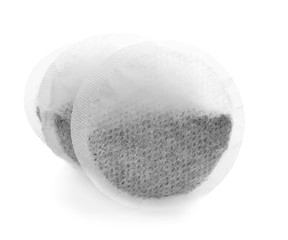 Tea bags on white background