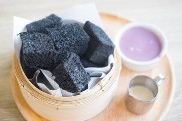 Charcoal is mixed in bread steamed