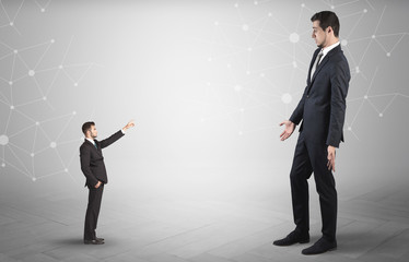 Small man aiming at a big man with network concept