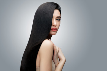 Brunette asian girl with long straight hair