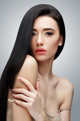 Brunette asian girl with long straight hair