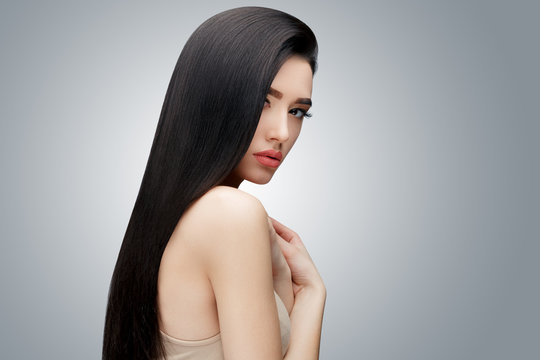 Brunette asian girl with long straight hair