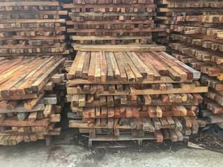 close up Wooden pallets stacked in a warehouse