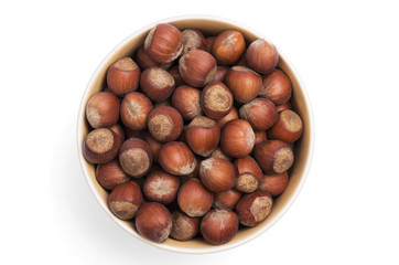 A cup full of hazelnuts