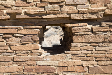 Circular opening through a wall at Chaco Canyon in New Mexico
