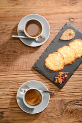 graphic refined design high angle view of two espresso coffee with cookies on plate