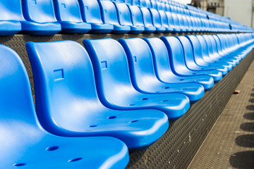 Naklejka premium Blue seats on the grandstand