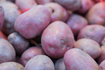 fresh red potatoes in the supermarket