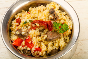 Bulgur with chicken hearts