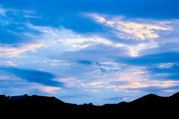 blue purple sky in starry night over mountains morning at the european alps