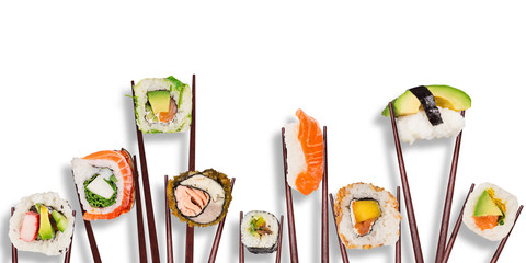 Traditional japanese sushi pieces placed between chopsticks, separated on white background.