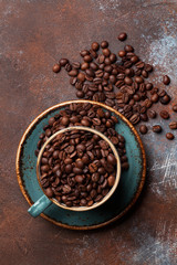 Coffee cup with roasted beans