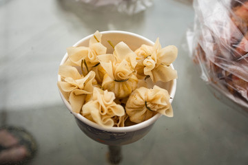Thai rangoon in the busket. Little thai dumplings. Thailand, Phuket.