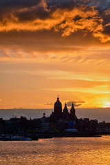Amsterdam cityscape skyline with  Church of Saint Nicholas on su