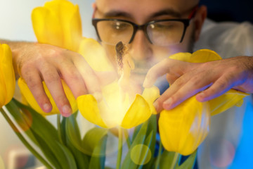 young scientist in glasses grew a sexy girl in the tulip