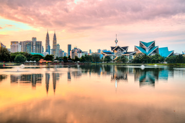 Fototapeta na wymiar Kuala Lumpur, Malaysia. Sunset skyline from Titiwangsa Park.