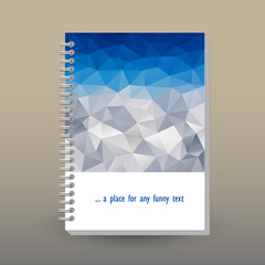 vector cover of diary or notebook with ring spiral binder - format A5 - layout brochure concept - blue sky over gray mountain landscape-  polygonal triangle pattern