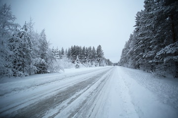 Fototapeta premium Icy road in Vaesterbotten in northern Sweden