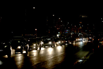 Fototapeta na wymiar image of traffic at night and from various lights and lights from cars running on the street.