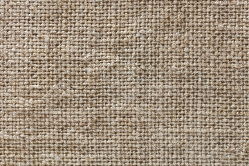 Rough texture of burlap, textile background closeup