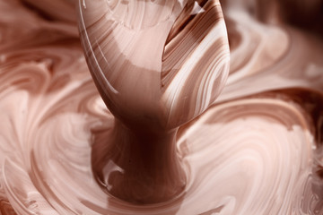 Abstract background, hot, melted chocolate and milk