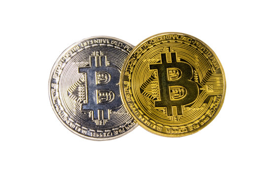 Golden and silver bitcoins isolated on white background