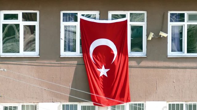 turkish flag hanging on a school window