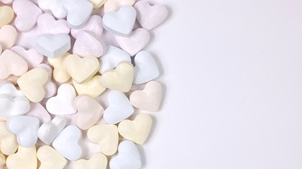 Fototapeta na wymiar Heart candy on white background with copy space
