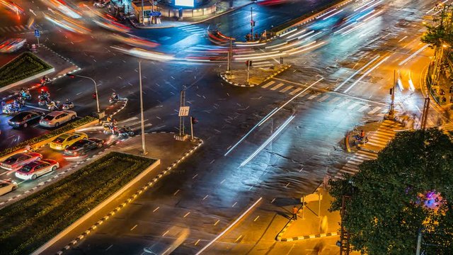 Cinemagraph 4K resolution, Cityscape Bangkok downtown at night, from the top of view on skyscraper,  show lighting on the road of communication concept. Abstract background with HRD effect filter.