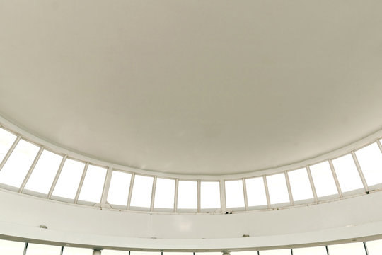 Abstract architecture. Close up of a modern dome with windows.