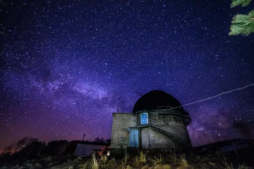  Night view of astronomical observatory against background of starry sky with milky way © Mulderphoto
