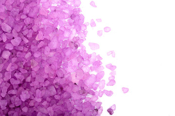 Violet sea salt isolated on white background, lavender with copy space for your text. Top view. Flat lay