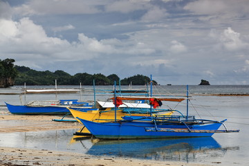 Fototapeta premium Balangay or bangka boats stranded on the beach. Punta Ballo-Sipalay-Philippines. 0315