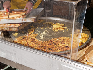 detail of ligurian farinata at market